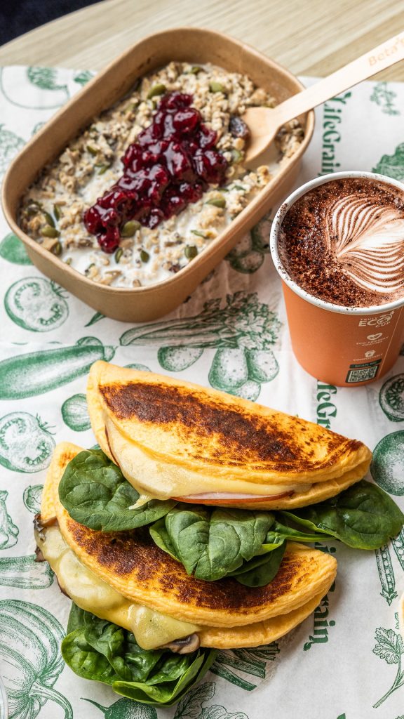 LifeGrain Everyday Healthy Choices Breakfast featuring ham and cheese omelette and mushroom and cheese omelette and oat porridge and cappucino